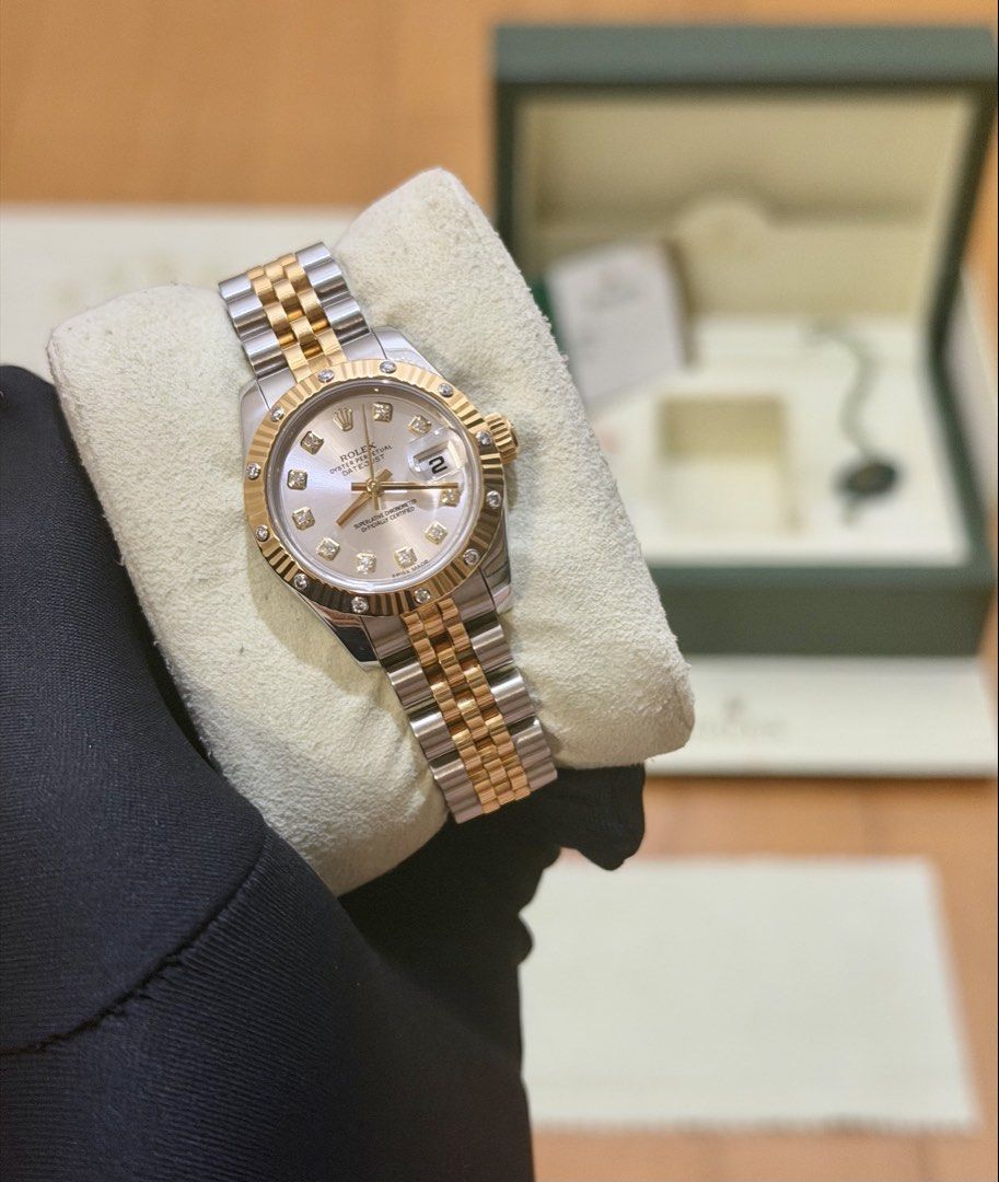 RARE 2015 Rolex Lady-Datejust 26 (Category: Luxury Watches) located in Makati City. Submitted by timefocusph (Listing ID 1456397562, Image 3). Description: For sale: RARE 2015 Rolex Lady-Datejust 26 • Ref. 179313 • 26mm case diameter • 💎 bezel and silver 💎 dial • Two-tone yellow gold • Continuous super jubilee bracelet • Full set- box, card, booklets and hang tag • 9.5/10 condition (Like New) Selling this for ₱595,000.00.
