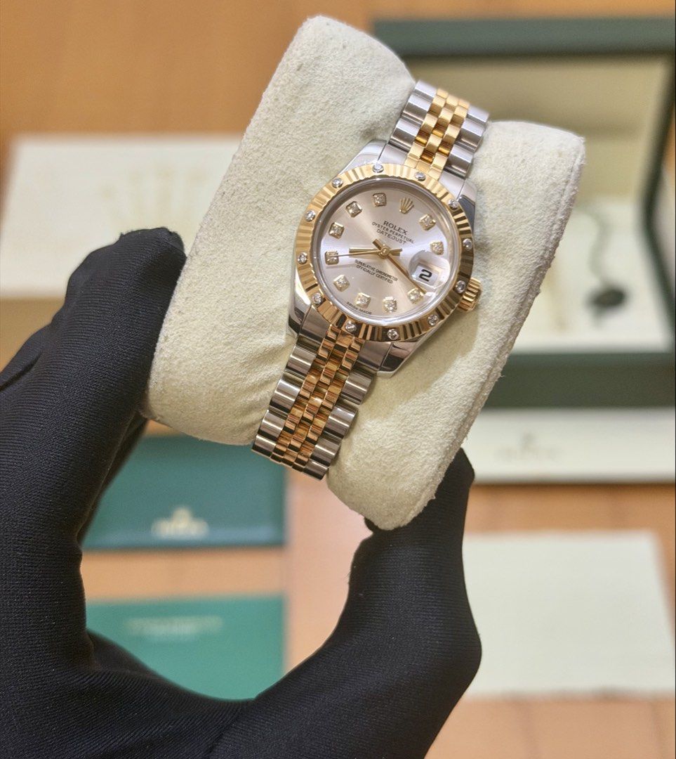 RARE 2015 Rolex Lady-Datejust 26 (Category: Luxury Watches) located in Makati City. Submitted by timefocusph (Listing ID 1456397562, Image 1). Description: For sale: RARE 2015 Rolex Lady-Datejust 26 • Ref. 179313 • 26mm case diameter • 💎 bezel and silver 💎 dial • Two-tone yellow gold • Continuous super jubilee bracelet • Full set- box, card, booklets and hang tag • 9.5/10 condition (Like New) Selling this for ₱595,000.00.