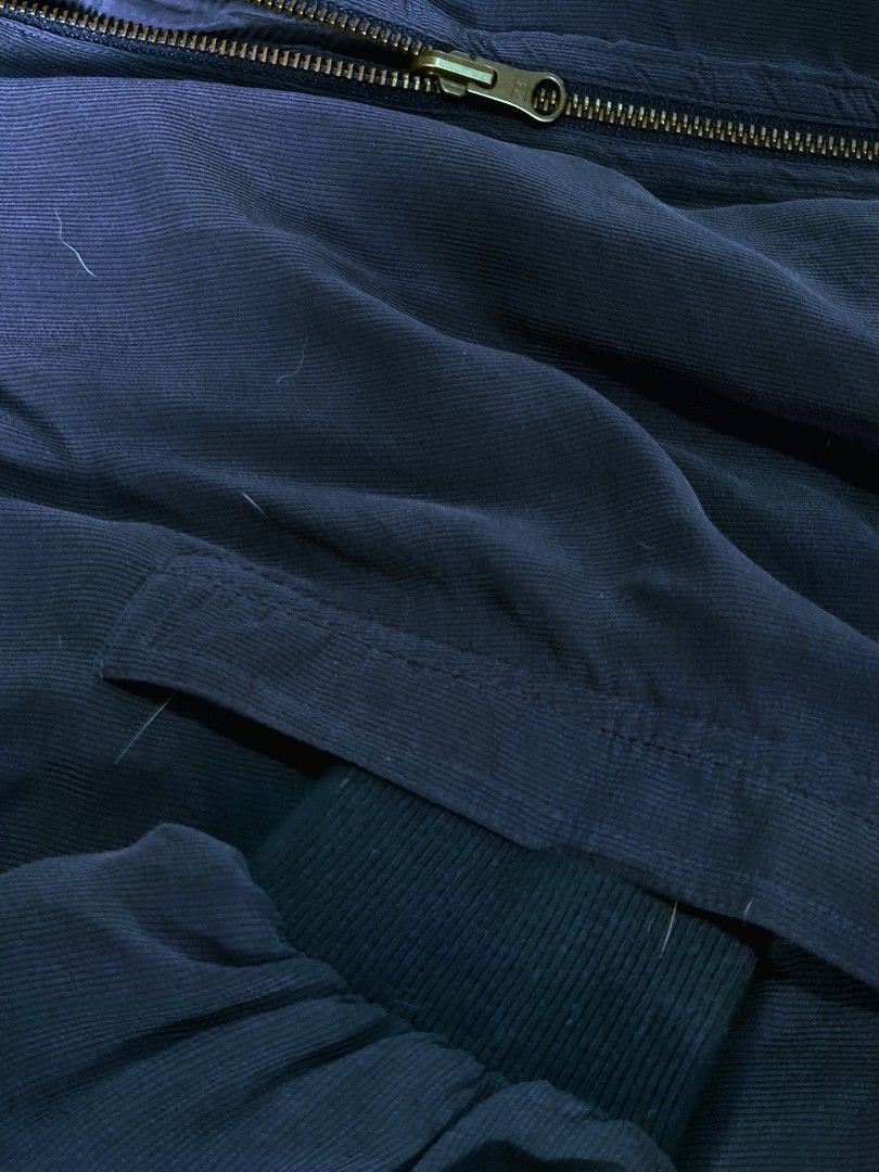 Reversible Bomber Jacket (Category: Coats, Jackets and Outerwear) located in Pateros City. Submitted by paoef (Listing ID 1456260139, Image 2). Description: Reversible Bomber Jacket -Fits size M (boxy fit) -Satin/soft corduroy fabric -YKK reversible zippers -Garters still intact *ISSUE: Missing button (see pic). Needs wash W: 24 L: 24 Sleeves: 22.