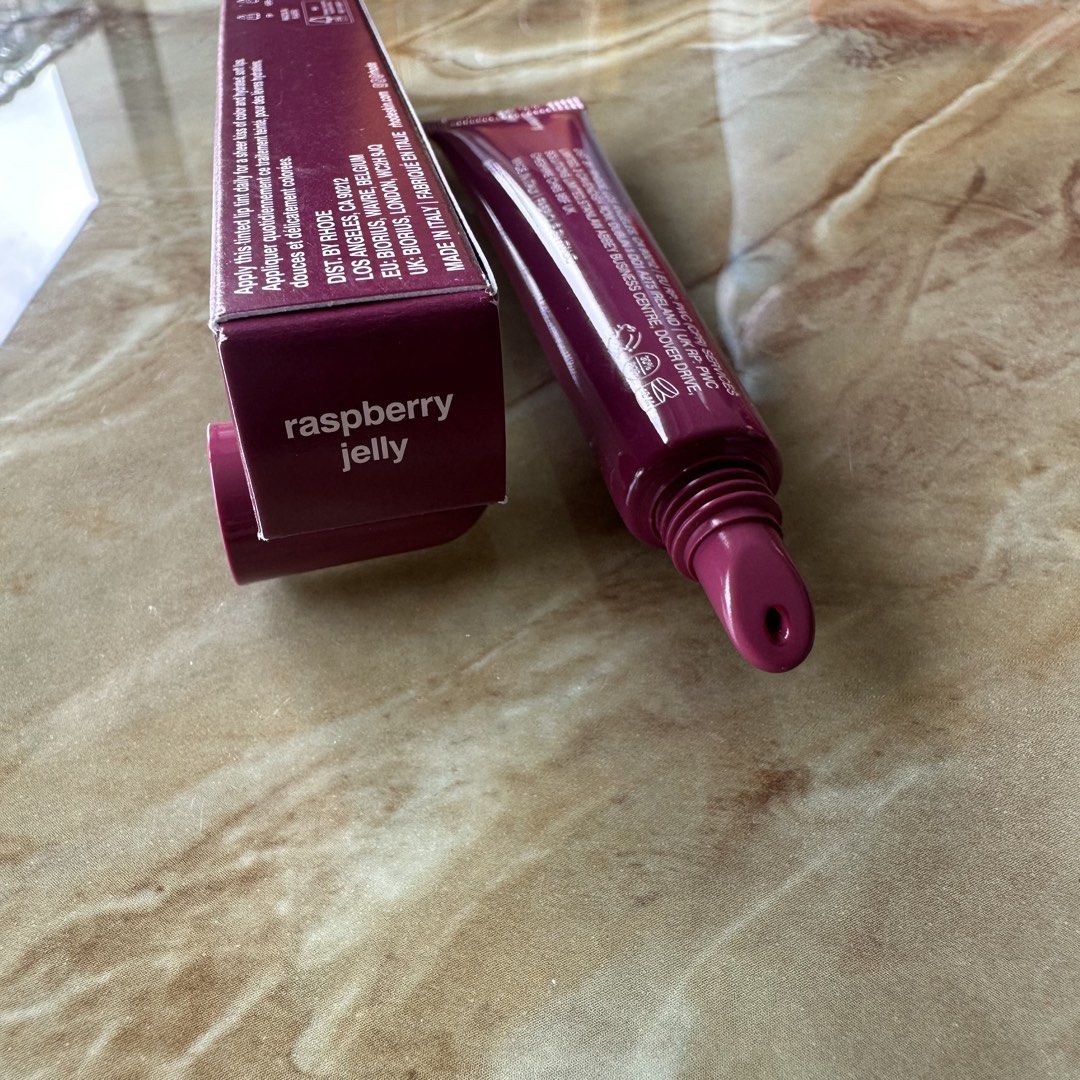 Rhode Peptide Lip Tint - Raspberry Jelly (Category: Makeup) located in Manila. Submitted by sundae_poppy (Listing ID 1456254677, Image 2). Description: - Rhode Peptide Lip Tint in Raspberry Jelly - Hydrating lip balm with a beautiful tint - Convenient 10ml tube - Proudly made in Italy - Ideal for everyday wear.