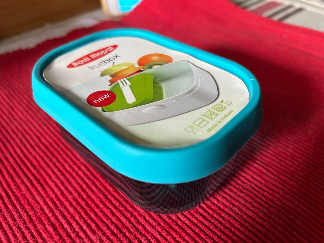 Rosti Mepal Fruitbox Lunch Box with Fork (Category: Food Organization & Storage) located in Calamba. Submitted by marjoh29436 (Listing ID 1456318286, Image 3). Description: A mini box perfect for storage of fruit and snack “to go” with a silicone lid cover, comes with a small fork for convenient snacking. Ideal for snacks or lunch / stylish turquoise color / easy to clean and use / suitable for kids and adults. UNUSED, Made in HOLLAND, 250ml (8.5