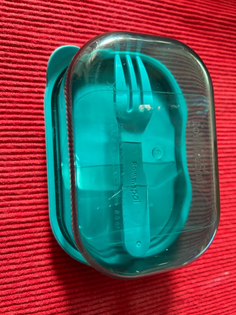 Rosti Mepal Fruitbox Lunch Box with Fork (Category: Food Organization & Storage) located in Calamba. Submitted by marjoh29436 (Listing ID 1456318286, Image 2). Description: A mini box perfect for storage of fruit and snack “to go” with a silicone lid cover, comes with a small fork for convenient snacking. Ideal for snacks or lunch / stylish turquoise color / easy to clean and use / suitable for kids and adults. UNUSED, Made in HOLLAND, 250ml (8.5