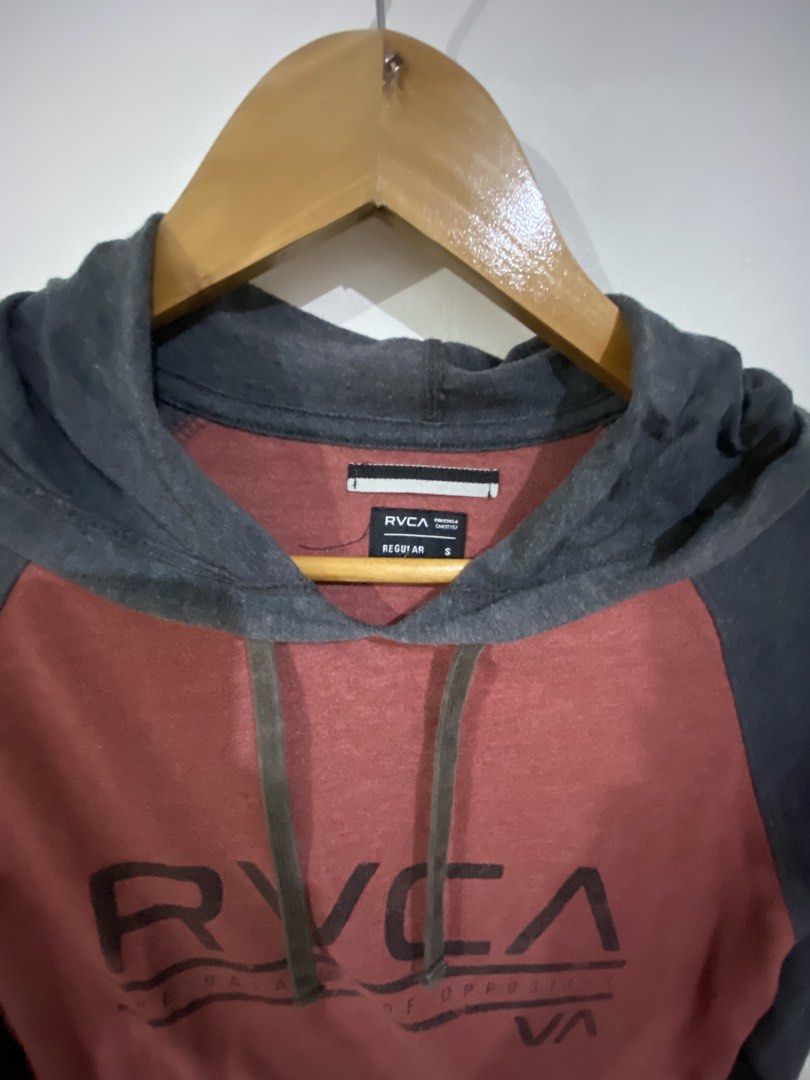 RVCA Raglan Hoodie Red Grey Size S (Category: Hoodies) located in Taguig. Submitted by djoseph (Listing ID 1456299496, Image 2). Description: - RVCA raglan hoodie - Red body with grey sleeves and hood - Features the RVCA logo on the front - Convenient kangaroo pocket - Adjustable drawstring hood - Perfect for casual everyday wear.