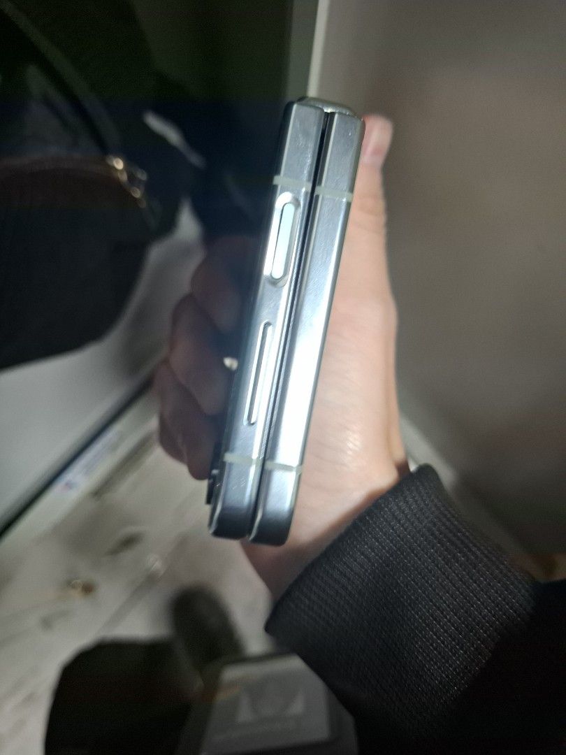 Samsung Galaxy Z Flip 5 (Category: Samsung) located in Marikina City. Submitted by alfong00 (Listing ID 1456400221, Image 3). Description: - Samsung Galaxy Z Flip 5 in Green - Innovative foldable design - Dual rear camera system - Expansive display when unfolded - Compact and stylish aesthetic - Perfect for on-the-go convenience flex issue but phone still works normally doesnt open/close properly, works when you leave the phone flat open.