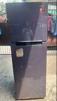 SAMSUNG REF RT22M4033UT/TC (Category: Refrigerators and Freezers) located in Caloocan City. Submitted by roxsell.00 (Listing ID 1456282964, Image 1). Description: - Samsung two-door refrigerator - Stylish dark grey/purple color - Energy-efficient Digital Inverter Technology - Fully functional, works great - Shows some exterior marks and wear, particularly on the bottom of the freezer door - Ideal for small families or as a convenient secondary fr