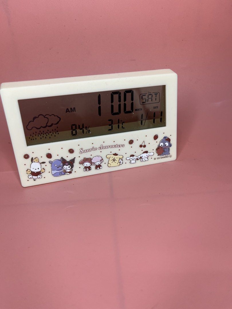 Sanrio Characters Multifunctional Digital Clock with Weather Display (Category: Clocks) located in Caloocan City. Submitted by snapshop_ph (Listing ID 1456294197, Image 1). Description: - Adorable Sanrio character design - Displays time, date, temperature, and humidity - Includes a weather forecast icon - Ideal for desks and bedside tables - Battery operated (batteries not included) - Perfect gift for Sanrio enthusiasts.