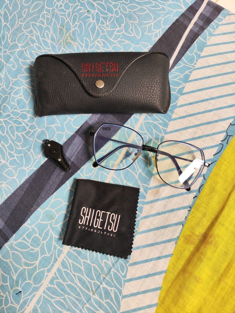 Shigetsu Eyeglasses with Case (Category: Sunglasses & Eyewear) located in Manila. Submitted by prelovedby_joie (Listing ID 1456271067, Image 1). Description: - Shigetsu eyeglasses - Anti Radiation - Includes a premium black leather case - Comes with a microfiber cleaning cloth - Bonus blue light tester included - Ideal for everyday wear and fashion accessory.