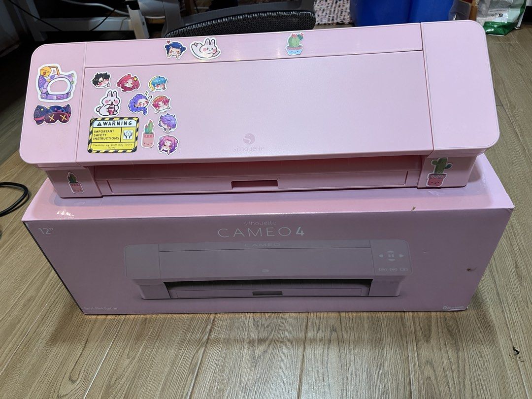 Silhouette Cameo 4 Cutting Machine - Pink (Category: Craft Supplies & Tools) located in Santo Tomas. Submitted by majajajan (Listing ID 1456314297, Image 1). Description: - Pink Silhouette Cameo 4 cutting machine - Includes original box - used only for sticker cutting - includes: auto blade, cutting mat and mat cleaner - No issues -Rfs: I don’t sell stickers so nakatambak na lang - Ideal for cutting vinyl, paper, and various crafting materials - 