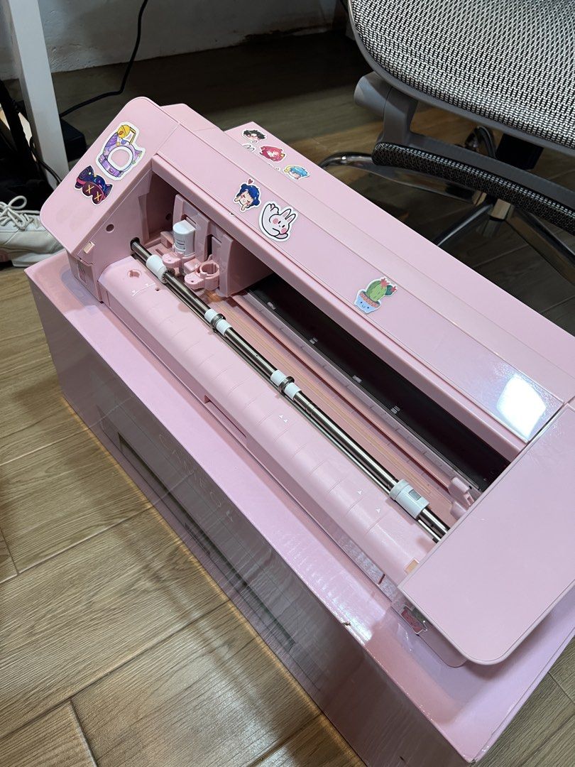 Silhouette Cameo 4 Cutting Machine - Pink (Category: Craft Supplies & Tools) located in Santo Tomas. Submitted by majajajan (Listing ID 1456314297, Image 3). Description: - Pink Silhouette Cameo 4 cutting machine - Includes original box - used only for sticker cutting - includes: auto blade, cutting mat and mat cleaner - No issues -Rfs: I don’t sell stickers so nakatambak na lang - Ideal for cutting vinyl, paper, and various crafting materials - 