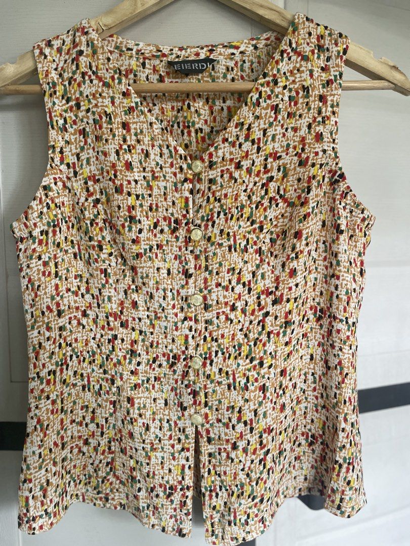 Sleeveless button down top (Category: Blouses) located in Roxas City. Submitted by budgetfindsroxasph (Listing ID 1456246368, Image 2). Description: M size Mine nyo na!! 140 .