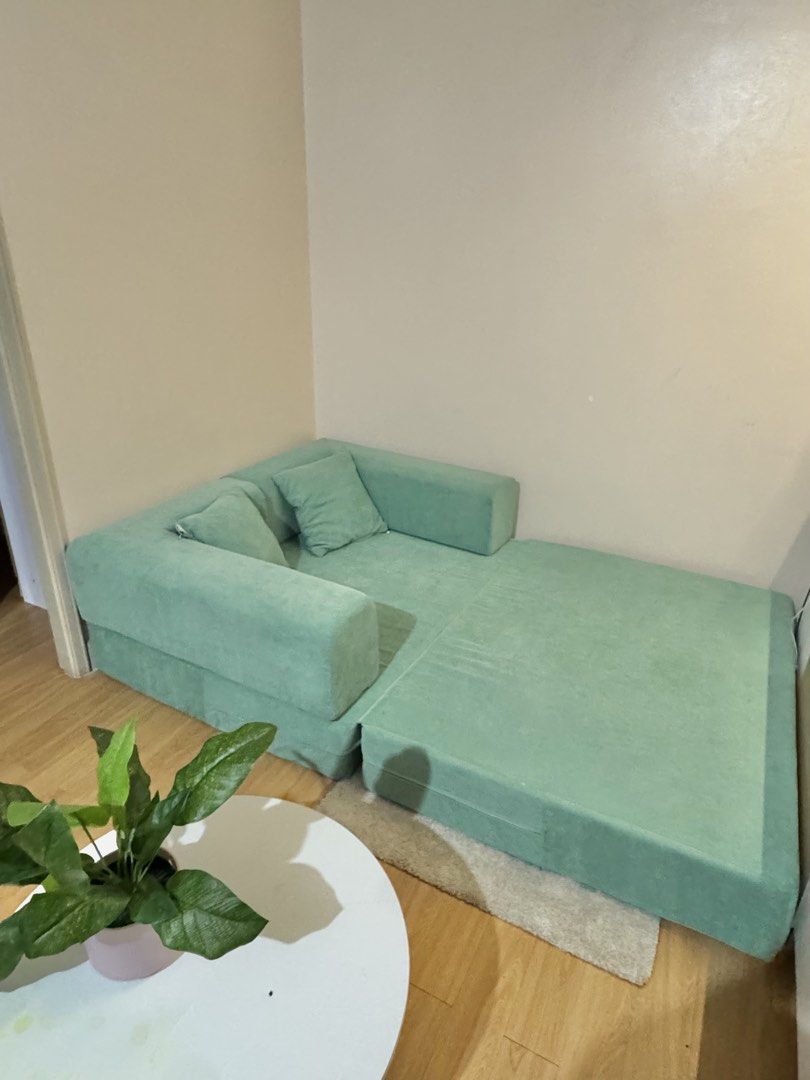 SOFABED (Category: Sofas) located in Manila. Submitted by cleverflower16 (Listing ID 1456414035, Image 3). Description: Pinacustomize po namin ito for 11k pesos last April 2026. Perfect for condo units or small spaces 😊 Legit Uratex foam po ito since sa Uratex dealer namin binili ung foam na ginamit. Dimensions: 103cm width, 65cm height RFS:We’re planning to buy a sofa na mismo so we’re selling this. Hindi pa gaanong nagagamit Loc: Paco, Manila.