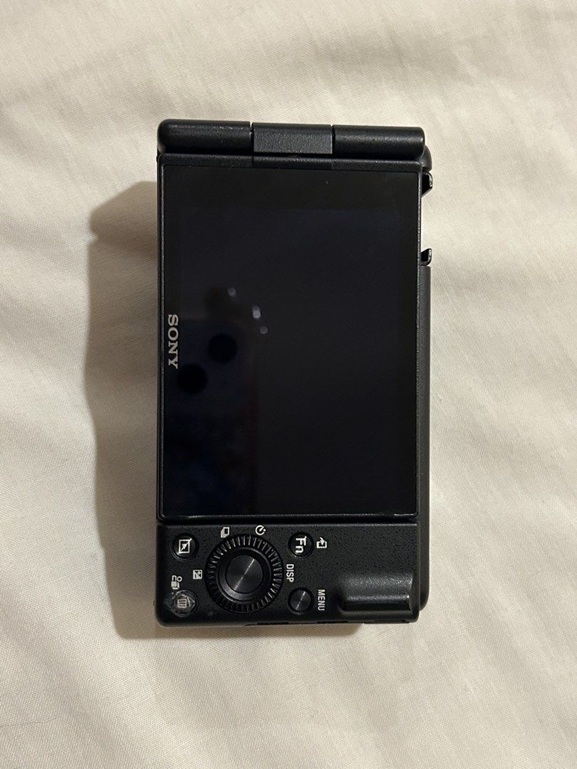 Sony ZV-1F Digital Camera with Accessories (Category: Cameras) located in Manila. Submitted by lex_declutters (Listing ID 1456254738, Image 2). Description: - Sony ZV-1 camera, perfect for vlogging & content creation. - Comes with a 64GB SanDisk memory card. - Includes a furry microphone windscreen for better audio. - Flip screen functions perfectly. - Lens is clean and scratch-free. - Ready to shoot straight out of the box!.