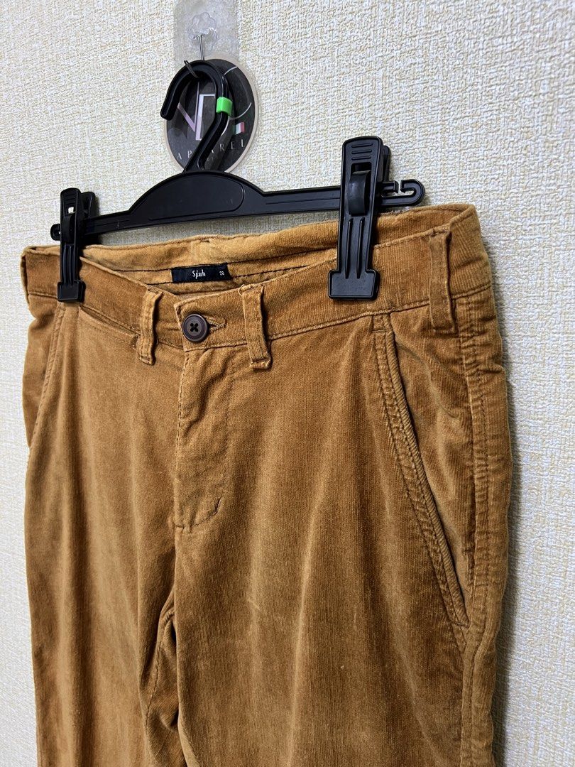 Splash tan corduroy trousers (Category: Jeans) located in Imus. Submitted by vdc.apparel (Listing ID 1456350308, Image 2). Description: Splash tan corduroy trousers feature a regular/slim-fit tailored design, stylized slant front pockets, and minimalist welt back pockets with button closures. Size 28 on tag.