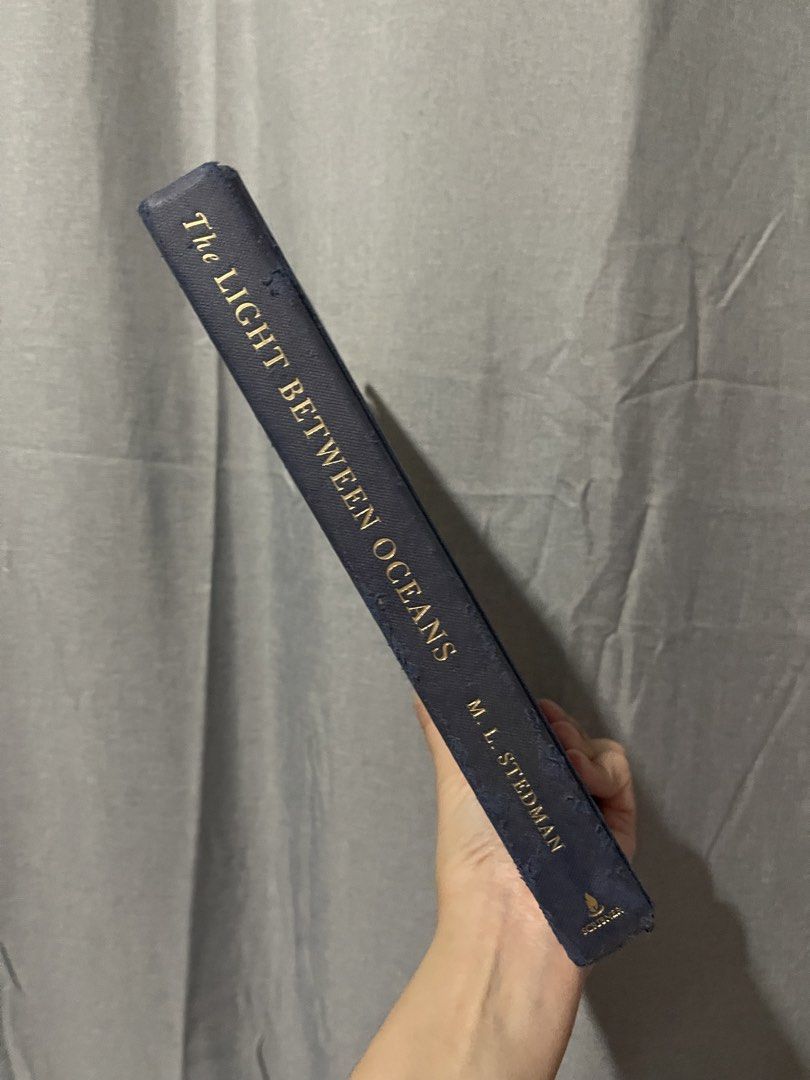 The Light Between Oceans by M. L. Stedman (Category: Storybooks) located in Manila. Submitted by princessdonut (Listing ID 1456385060, Image 1). Description: - Hardcover •The Light Between Oceans (₱300): Has tears on the outer cover of the book, water stain on the front cover, a bit of tanning .