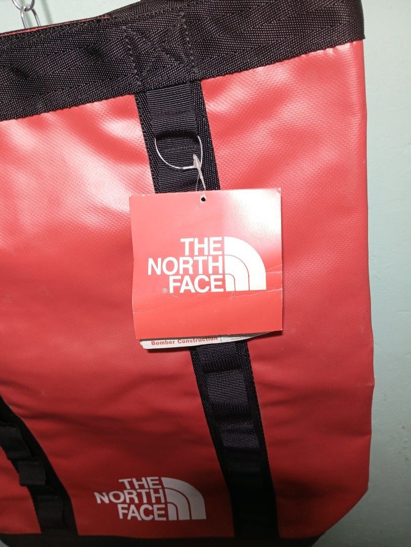 The North Face Base Camp Tool Sack Backpack (Category: Backpacks) located in Quezon City. Submitted by thesecondmarketph (Listing ID 1456405336, Image 3). Description: - The North Face Base Camp Tool Sack - Color: TNF Red/Black - Versatile backpack & tote bag design - Features classic TNF logo on the front - Sturdy straps and durable construction - Ideal for carrying essentials - 19 Liters capacity - Original tags attached - 16x18.