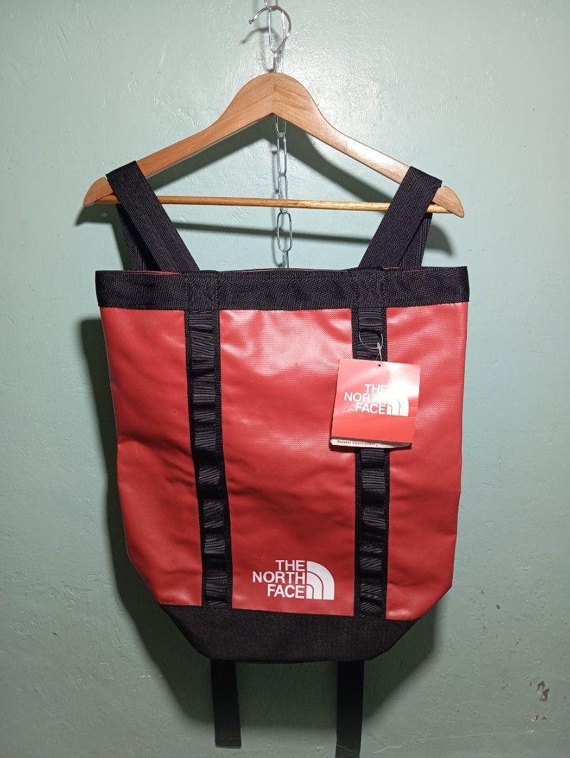 The North Face Base Camp Tool Sack Backpack (Category: Backpacks) located in Quezon City. Submitted by thesecondmarketph (Listing ID 1456405336, Image 1). Description: - The North Face Base Camp Tool Sack - Color: TNF Red/Black - Versatile backpack & tote bag design - Features classic TNF logo on the front - Sturdy straps and durable construction - Ideal for carrying essentials - 19 Liters capacity - Original tags attached - 16x18.