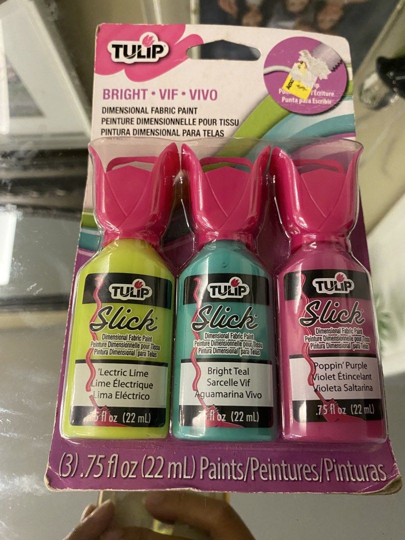 Tulip Slick Dimensional Fabric Paint Set - 3 Colors (Category: Craft Supplies & Tools) located in Santa Rosa. Submitted by hoardqueensdeclutter (Listing ID 1456354281, Image 1). Description: - Set of 3 Tulip Slick dimensional fabric paints - Colors included: Lectric Lime, Bright Teal, and Poppin' Purple - Ideal for adding detailed designs to fabric - Versatile for lines, dots, press, and stitch techniques - Instructions for use are provided on th