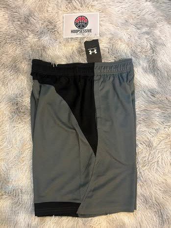 Under Armour Men's Grey Black Athletic Shorts (Category: Activewear) located in Manila. Submitted by hoopsessive (Listing ID 1456418211, Image 2). Description: - Brand: Under Armour - Color: Grey and Black - Features: Elastic waistband with drawstring, side pockets - Material: Comfortable and breathable fabric - Ideal for: Training, gym, or everyday casual wear.