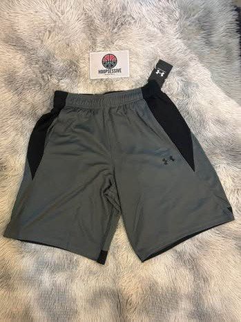 Under Armour Men's Grey Black Athletic Shorts (Category: Activewear) located in Manila. Submitted by hoopsessive (Listing ID 1456418211, Image 1). Description: - Brand: Under Armour - Color: Grey and Black - Features: Elastic waistband with drawstring, side pockets - Material: Comfortable and breathable fabric - Ideal for: Training, gym, or everyday casual wear.