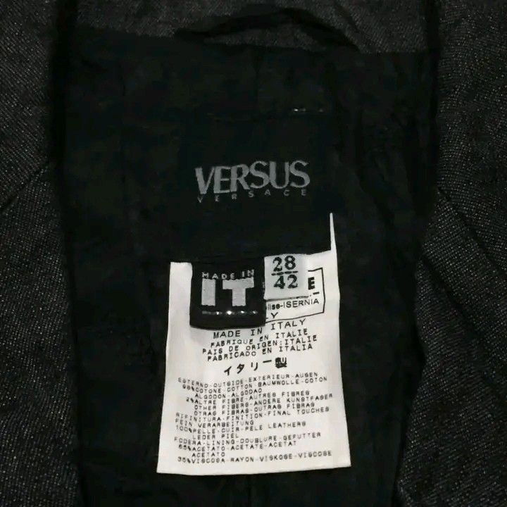 Versus Versace Dark Grey Blazer Jacket (Category: Coats, Jackets and Outerwear) located in Calbayog City. Submitted by taking-candy.ph (Listing ID 1456338902, Image 3). Description: - Genuine Versus Versace dark grey blazer - Expertly crafted in Italy - Features classic button closure - Includes stylish pocket details - Estimated size: 42 - Perfect for both formal and casual styling.