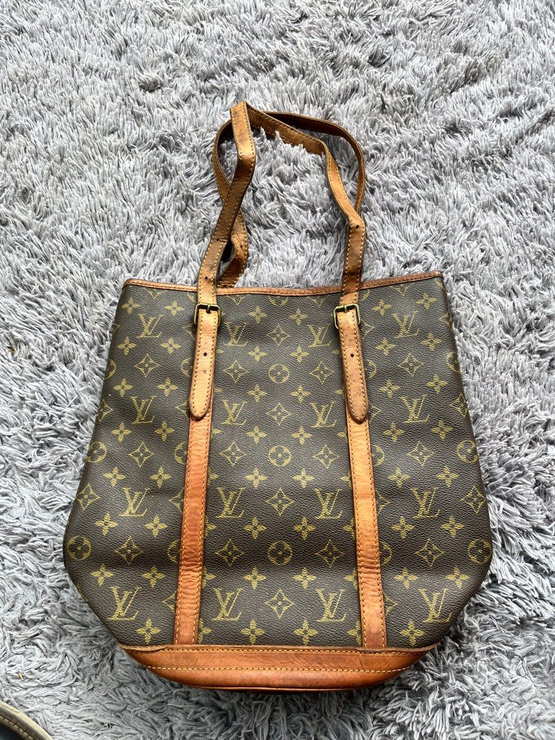 VINTAGE LV BUCKET TOTEBAG (Category: Tote Bags) located in Dipolog. Submitted by janja2002 (Listing ID 1456390287, Image 1). Description: MISSING one button but No issue yung mga leather nya Sobrang solid po.
