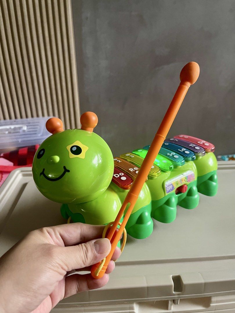 VTECH Xylophone (Category: Educational & Learning Toys) located in Quezon City. Submitted by basicsandessentials (Listing ID 1456288336, Image 3). Description: - 100% working -Fun caterpillar xylophone toy - Plays different musical notes - Lights up when played - Comes with a mallet - Perfect for little ones learning music - Bright green color - Batteries not included (AAx2) MOP:Bank transfer/ GCASH ❌No return, exchange or change of mind returns 