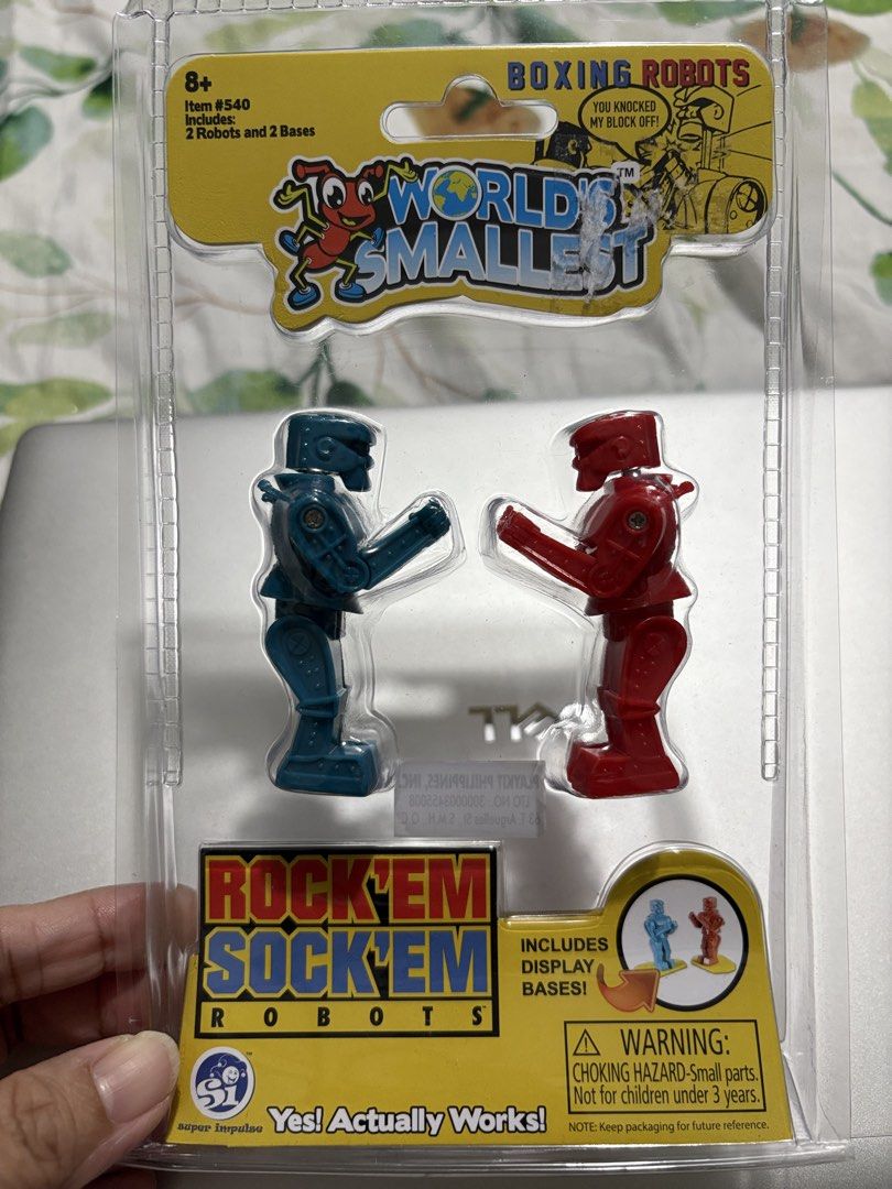 World's Smallest Rock 'Em Sock 'Em Robots & Etch A Sketch (Category: Vintage Collectibles) located in Manila. Submitted by ticklememommy (Listing ID 1456411570, Image 2). Description: - World's Smallest Rock 'Em Sock 'Em Robots (Collector's Edition) - World’s Smallest Etch A Sketch - Both are sealed in original packaging - Rock 'Em Sock 'Em Robots include display bases - Ideal for collectors and fans of classic toys - Selling as set -Location : S