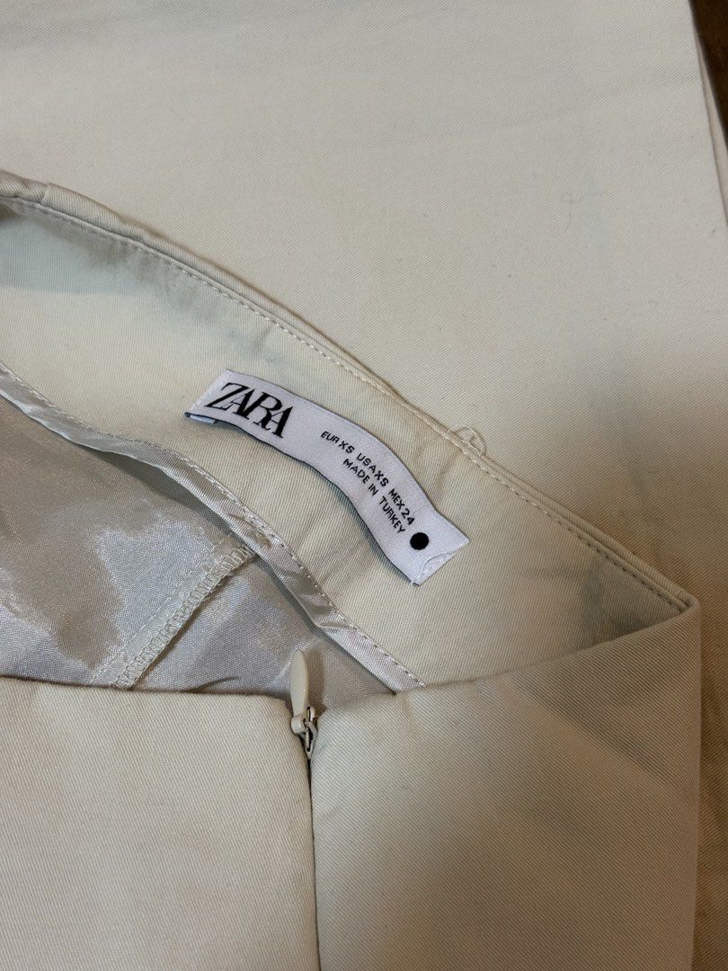 Zara Beige Wrap Skirt with Pocket (Category: Skirts) located in Makati City. Submitted by pautra (Listing ID 1456317715, Image 3). Description: - Zara beige wrap skirt - Size XS - Front pocket detail - Side tie closure - Really good quality - Never worn.