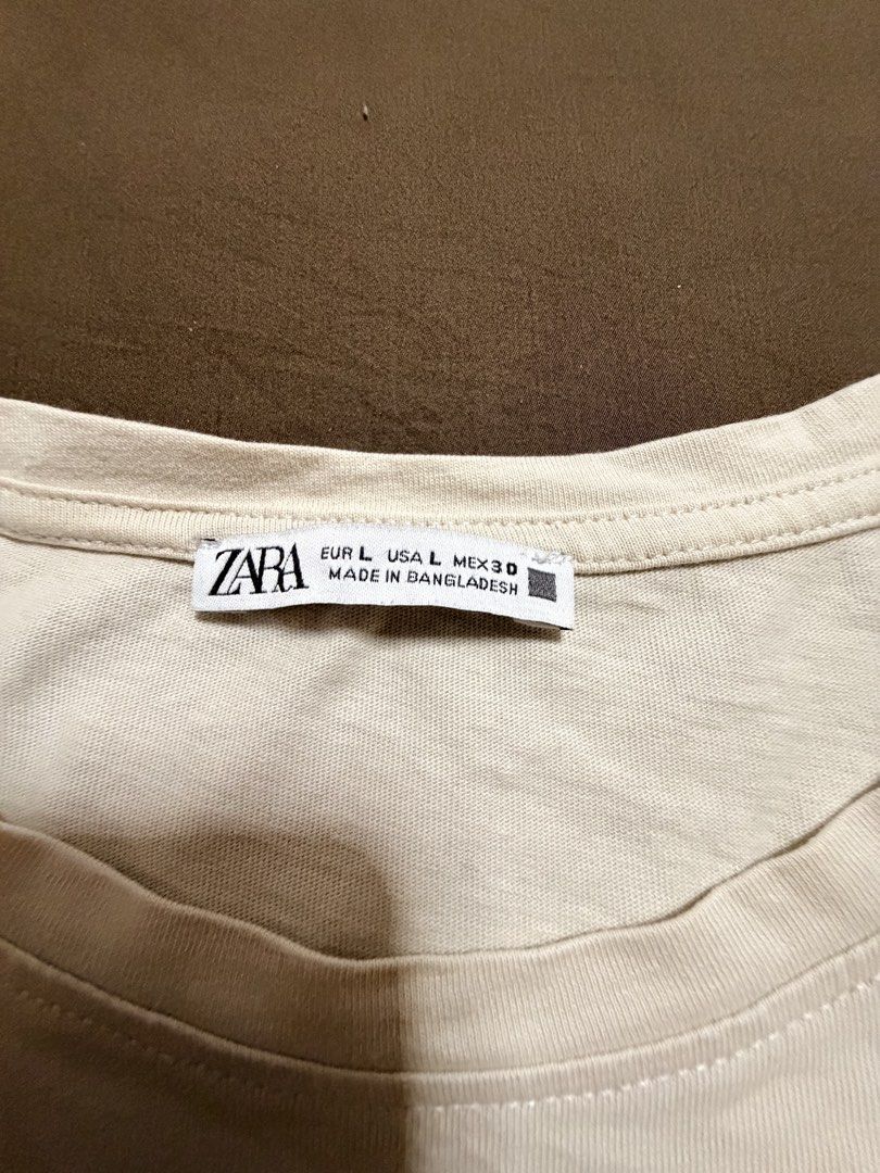 Zara boxy top / shirt (Category: Shirts) located in Quezon City. Submitted by bloompicks (Listing ID 1456387883, Image 3). Description: No issues. Beige color.
