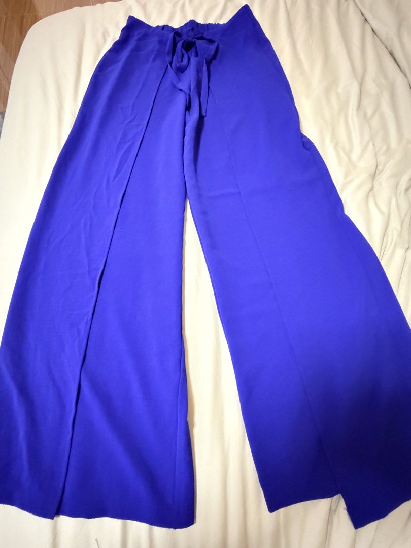 Zara flowy wrap pants (Category: Other Bottoms) located in Quezon City. Submitted by bloompicks (Listing ID 1456324721, Image 1). Description: Used 3x only. No issues like new. Super cute and lightweight Wide leg fit L: 43 W: 15.5-20.5 XL in tag.
