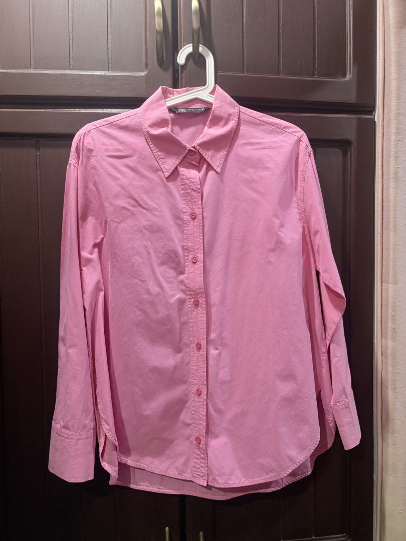 Zara Pink Button-Up Shirt (Category: Shirts) located in Manila. Submitted by sofiacarm15 (Listing ID 1456348114, Image 1). Description: - Classic pink button-up shirt from Zara - Long sleeves with button cuffs - Simple and versatile design - Ideal for casual or smart-casual styling - Easy to pair with various outfits.