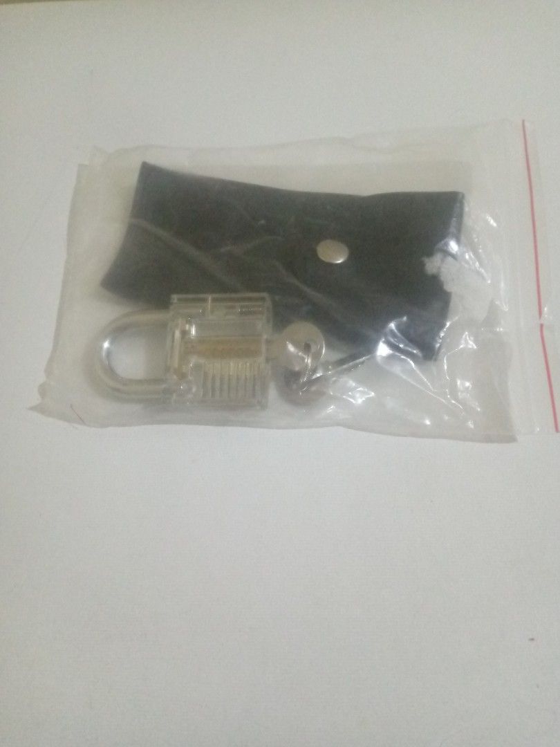 20 pcs Lock Picking Practice Set with Padlock and Case (Category: Everything Else Others) located in Manila. Submitted by shopwithrye (Listing ID 1448277491, Image 1). Description: From ₱250 - ₱200 - Practice padlock with clear view of pins - Comes with a complete set of lock picking tools - Includes a small black case for organization - Perfect for beginners learning lock picking - All items are brand new and sealed in plastic.