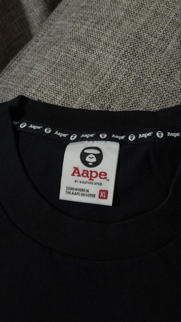 AAPE Moonface logo short sleeve tee XL (Category: Tshirts & Polo Shirts ) located in Manila. Submitted by frappiechin0 (Listing ID 1456491226, Image 2). Description: AAPE Moonface logo short sleeve tee XL Relax fit used once. like new 📍qc.