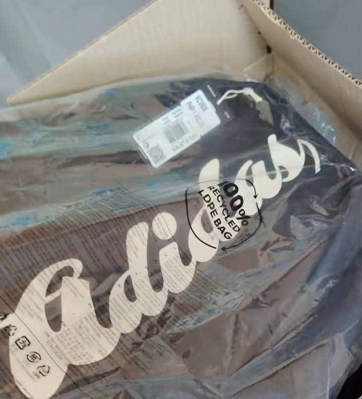 Adidas Backpack Black with White Logo (Category: Backpacks) located in Calamba. Submitted by discounted4u (Listing ID 1456485893, Image 2). Description: - Brand new Adidas backpack - Color: Black with large white logo - Features side mesh pockets for water bottles or essentials - Comes in original packaging and recycled LDPE bag - Original tag price: PHP 1,400.00.