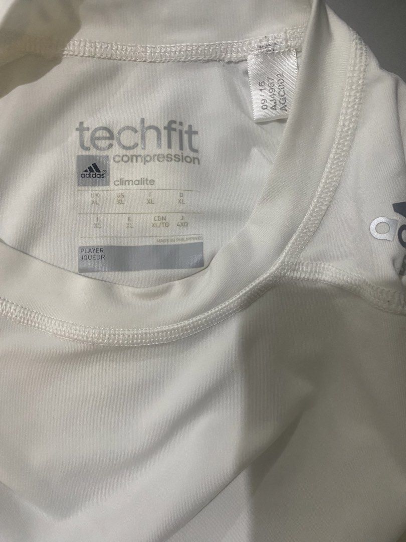 Adidas Techfit Compression Climalite T-shirt XL White (Category: Activewear) located in Quezon City. Submitted by eljivie (Listing ID 1456548253, Image 3). Description: - White Adidas Techfit Compression T-Shirt - Size: XL - Features Climalite fabric for excellent breathability - Made in the Philippines - Perfect for sports activities or casual everyday wear - Please check photos for detailed condition.