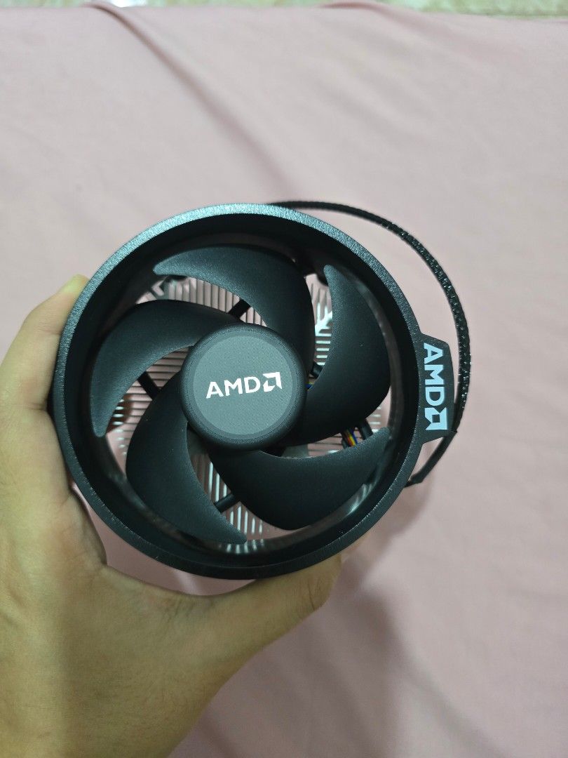 AMD CPU Cooler/ Stock Fan (Category: Computer Parts) located in Silang. Submitted by ajmnlc (Listing ID 1456444954, Image 1). Description: - AMD CPU Cooler and Fan - Comes in original box - Selling due to system upgrade.