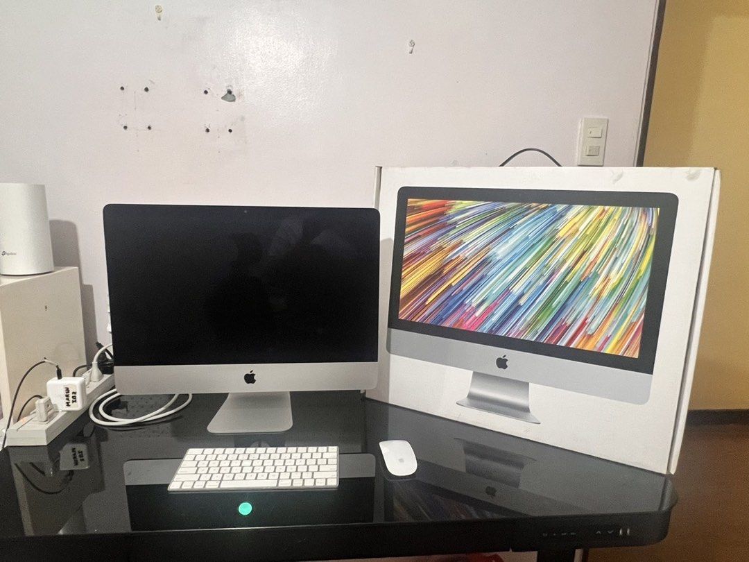 Apple iMac 21.5-inch Desktop Computer with Keyboard and Mouse (Category: Desktops) located in Paranaque City. Submitted by enchanting_f1nds (Listing ID 1456497672, Image 2). Description: - 2021 acquired - Sleek silver Apple iMac desktop computer - Original Magic Keyboard included - Original Magic Mouse included - Ideal all-in-one setup for home or office - Power cable included - Ready for a new owner.