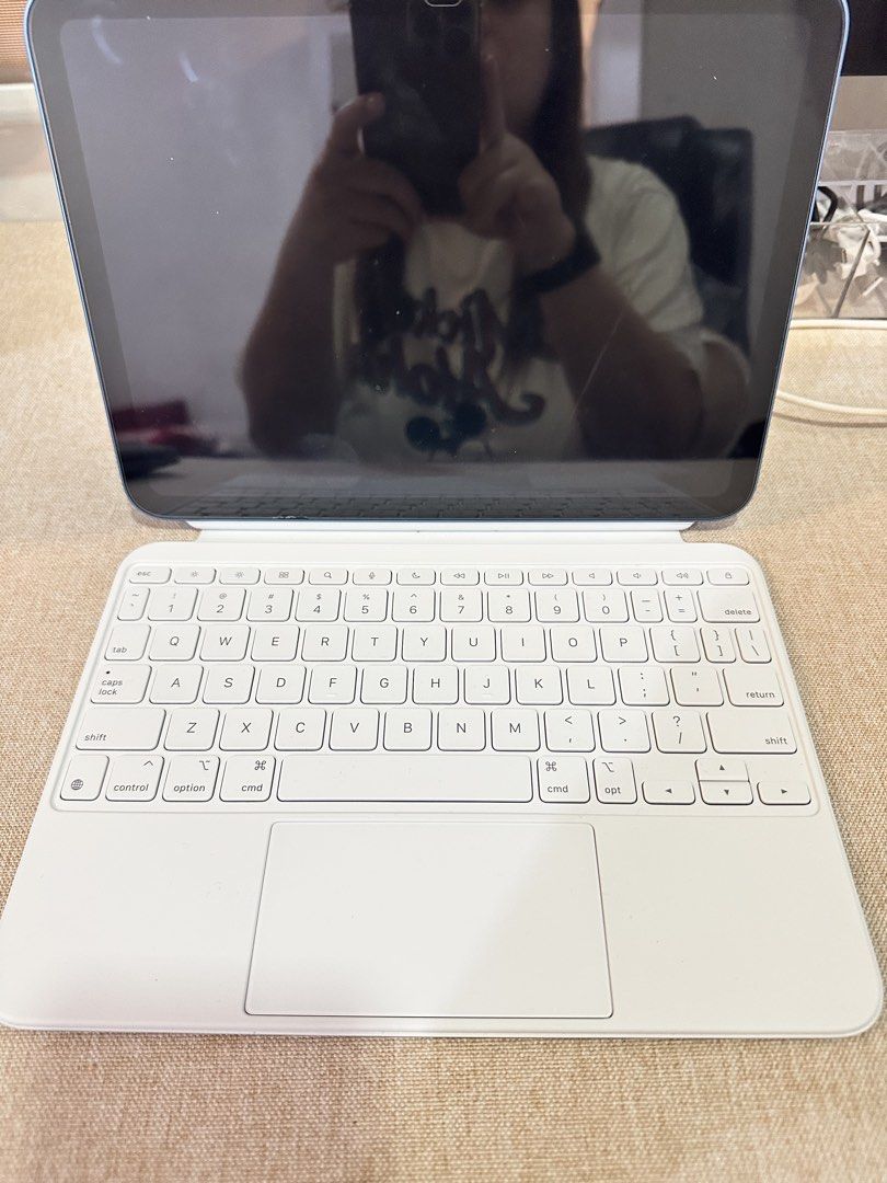 Apple iPad Magic Keyboard Folio 10th Gen (Category: Cases & Sleeves) located in General Mariano Alvarez. Submitted by jellaaatine (Listing ID 1456516167, Image 3). Description: Magic Keyboard Folio for iPad 10th Gen – White Original Price: ₱16,490 Selling Price: P12,000 — slightly negotiable Purchased: July 11, 2026 (receipt uploaded) Note: iPad is not included. It’s only shown in the photos to demonstrate how the Magic Keyboard Folio looks when 