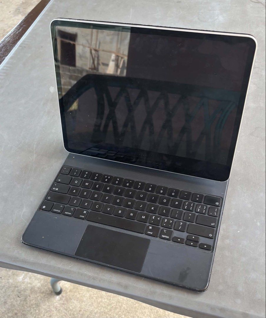 Apple iPad Pro 12.9-inch (5th Gen) with Magic Keyboard (Category: iPad) located in Makati City. Submitted by keiishall (Listing ID 1456477468, Image 1). Description: - iPad Pro 12.9-inch (5th generation) - 128GB storage - Latest iPadOS 26.3.1 - Includes Magic Keyboard - Ideal for work and creative projects.