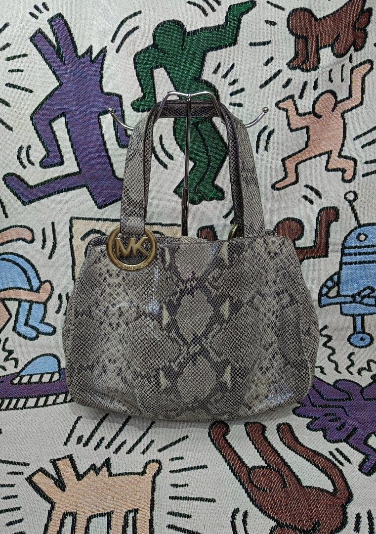 Authentic Vintage Michael Kors Python-Embossed Leather Shoulder Bag (Category: Luxury Bags & Wallets) located in Taguig. Submitted by handpickedreplay (Listing ID 1456590403, Image 1). Description: Authentic Vintage Michael Kors Python-Embossed Leather Shoulder Bag 👽 - Authenticity Verified: Fully authenticated with the internal gray origin tag and official production tracking code (E-1209) stamped neatly inside. - Interior: Spotless beige signa