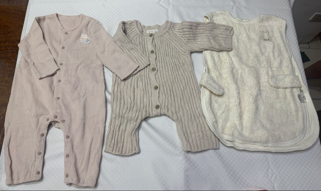 Baby Sleepsuit Set (Category: Babies & Kids Fashion) located in Muntinlupa City. Submitted by readthedetails (Listing ID 1456549586, Image 1). Description: - Three-piece baby outfit set - Includes: light pink ribbed sleepsuit (snap buttons, bunny patch), beige knit romper (wooden buttons), cream fleece sleep bag (bear embroidery) - Ideal for keeping your baby warm and comfortable.