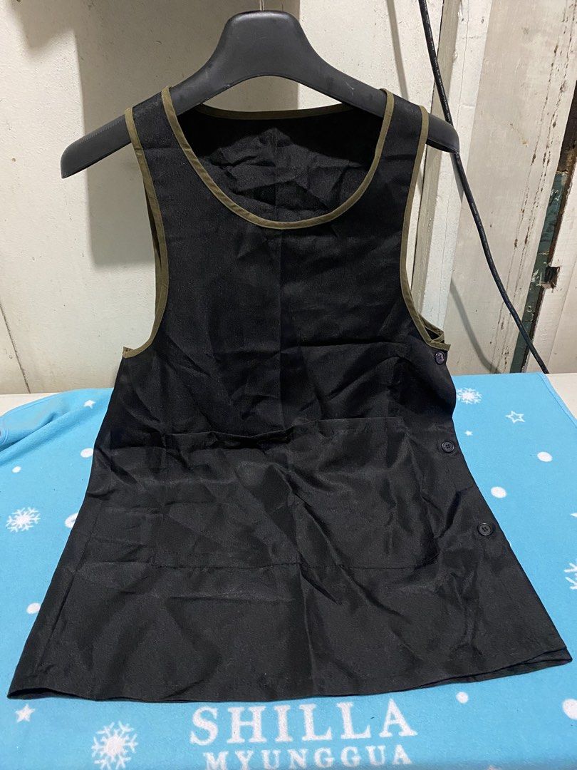Black Apron with Side Buttons and Pockets (Category: Coats, Jackets and Outerwear) located in Manila. Submitted by resi.diaz (Listing ID 1456539070, Image 1). Description: - Black apron with stylish olive green trim - Two convenient front pockets - Easy side button closure - Versatile for cooking, crafting, work, or home use - Simple to wear and maintain (easy to clean).