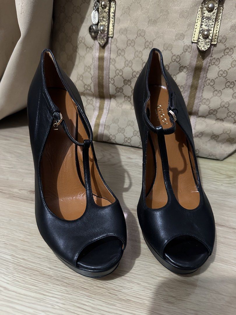 Black Leather T-Strap Heels (Category: Heels) located in Manila. Submitted by naixor_thrift (Listing ID 1456494584, Image 1). Description: - Classic black leather heels - Size 38.5 - T-strap design - Adjustable ankle strap for a secure fit - Versatile: perfect for work or a night out.