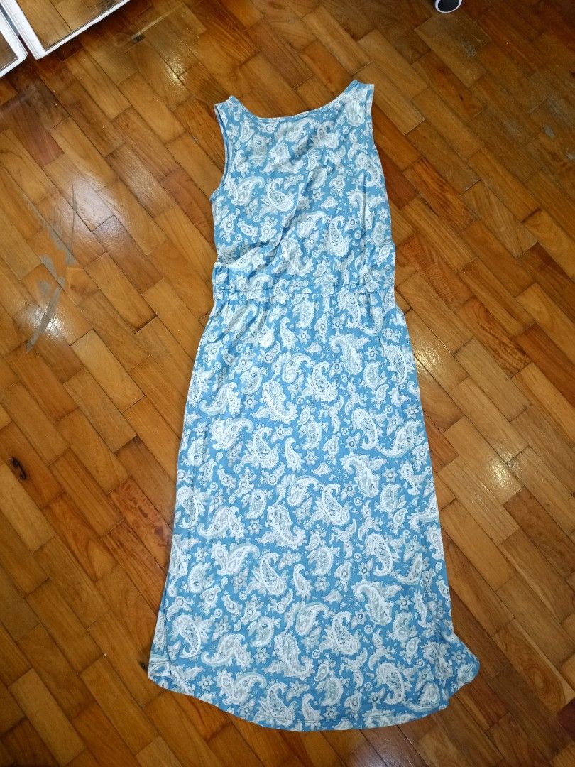 Blue Paisley Print Maxi Dress (Category: Dresses) located in Quezon City. Submitted by cheecharon (Listing ID 1456433252, Image 1). Description: - Light blue maxi dress - White paisley print - Elasticated waist for comfort - With inner pads - Ideal for casual outings or beach days - Easy to wear and style.