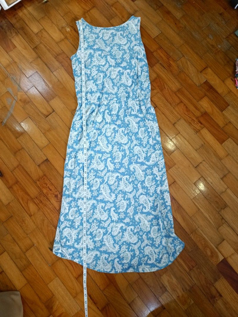 Blue Paisley Print Maxi Dress (Category: Dresses) located in Quezon City. Submitted by cheecharon (Listing ID 1456433252, Image 3). Description: - Light blue maxi dress - White paisley print - Elasticated waist for comfort - With inner pads - Ideal for casual outings or beach days - Easy to wear and style.