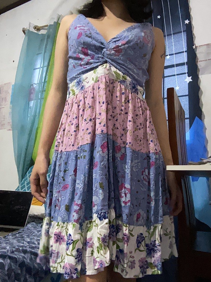 Blue Periwinkle Pink Floral Patchwork Mini Dress Spaghetti Straps (Category: Dresses) located in Alfonso. Submitted by glenngarcia03 (Listing ID 1455688043, Image 2). Description: - Adorable patchwork mini dress with adjustable strap - Features blue floral print on top and bottom - Contrasting pink floral section in the middle - Delicate spaghetti straps - Flattering sweetheart neckline - Trendy ruffled hemline - Ideal for summer outings and warm