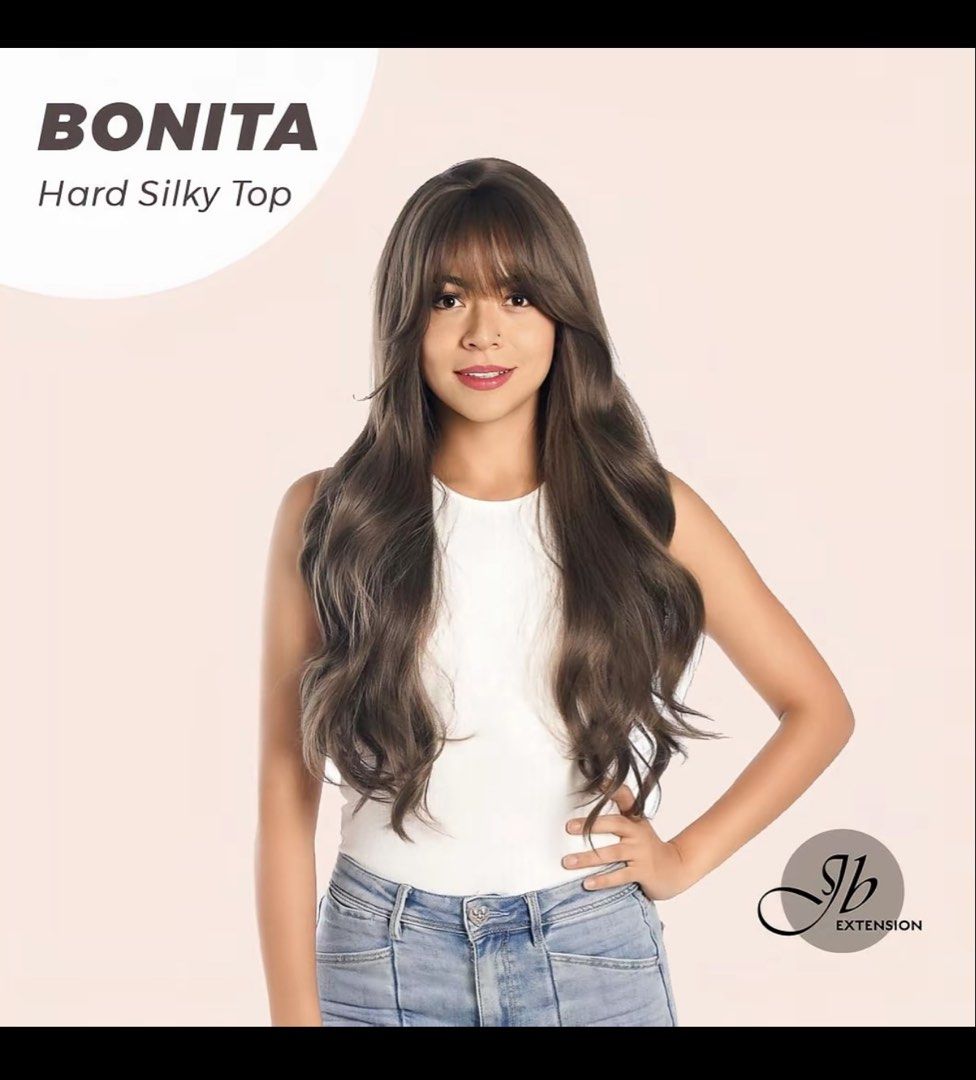 BONITA Hard Silk Top Long Wavy Wig with Bangs (Category: Hair Accessories) located in Cavite. Submitted by abadsarah (Listing ID 1456533740, Image 2). Description: - BONITA wig with hard silk top - Long and wavy style - Features bangs - Beautiful taupe brown color - Looks natural and feels soft - Ideal for a new look or costume.