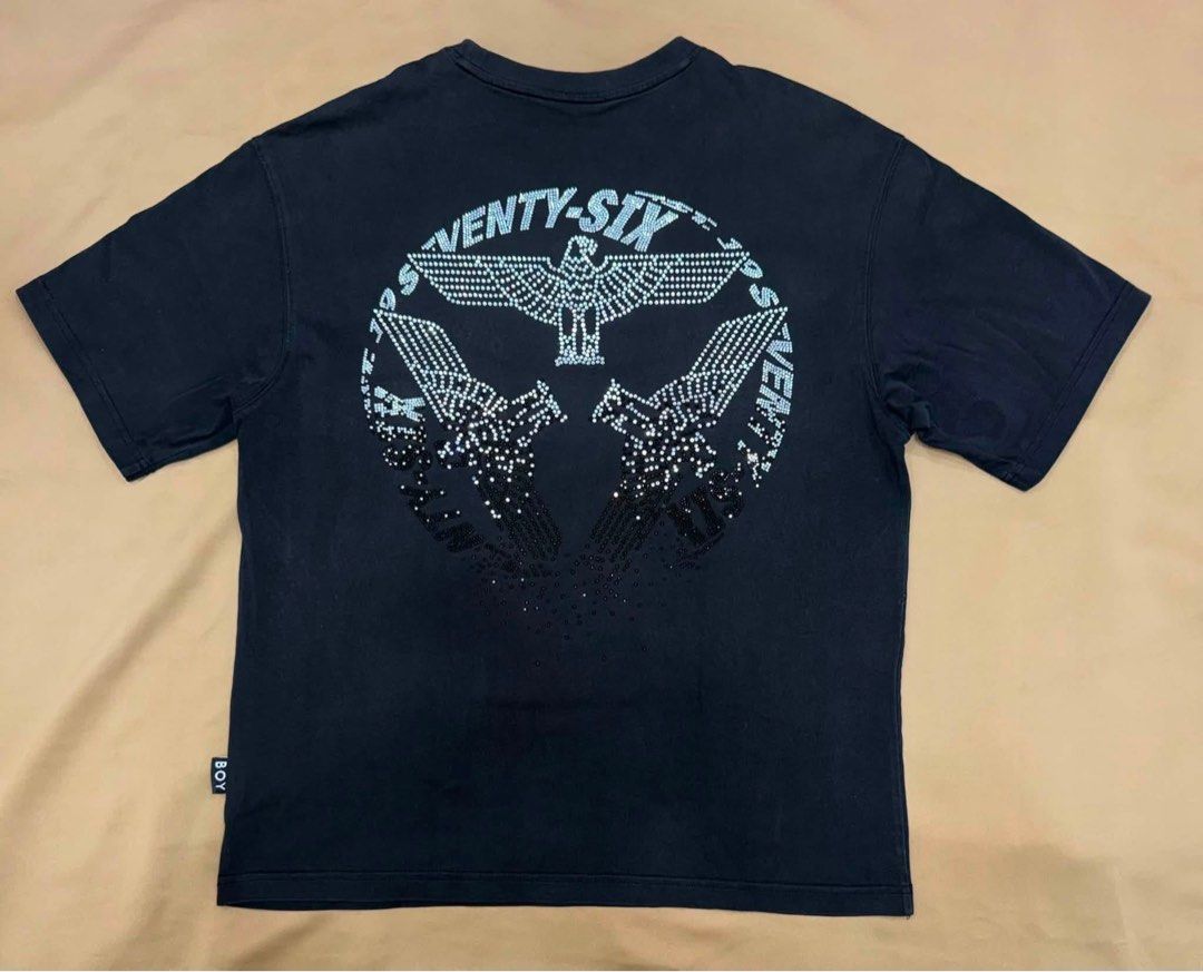 BOY London T-shirt Eagle Graphic Black (Category: Tshirts & Polo Shirts ) located in Quezon City. Submitted by domsselections2 (Listing ID 1456448581, Image 2). Description: - Brand: BOY London - Color: Black - Front graphic print - Large eagle graphic on back with 'TWENTY-SIX' text - Material: Cotton - Ideal for casual wear.