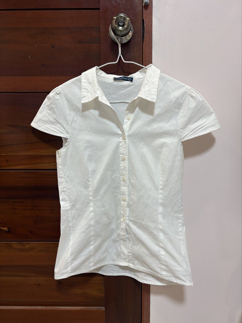 Brandy Melville Rue Top (in White) (Category: Others Tops) located in Quezon City. Submitted by jjccly (Listing ID 1456576714, Image 2). Description: pre-loved pls manage ur expectations has minimal discoloration on ua (barely visible -> see last pics) no other flaws/issues rfs: decluttering .