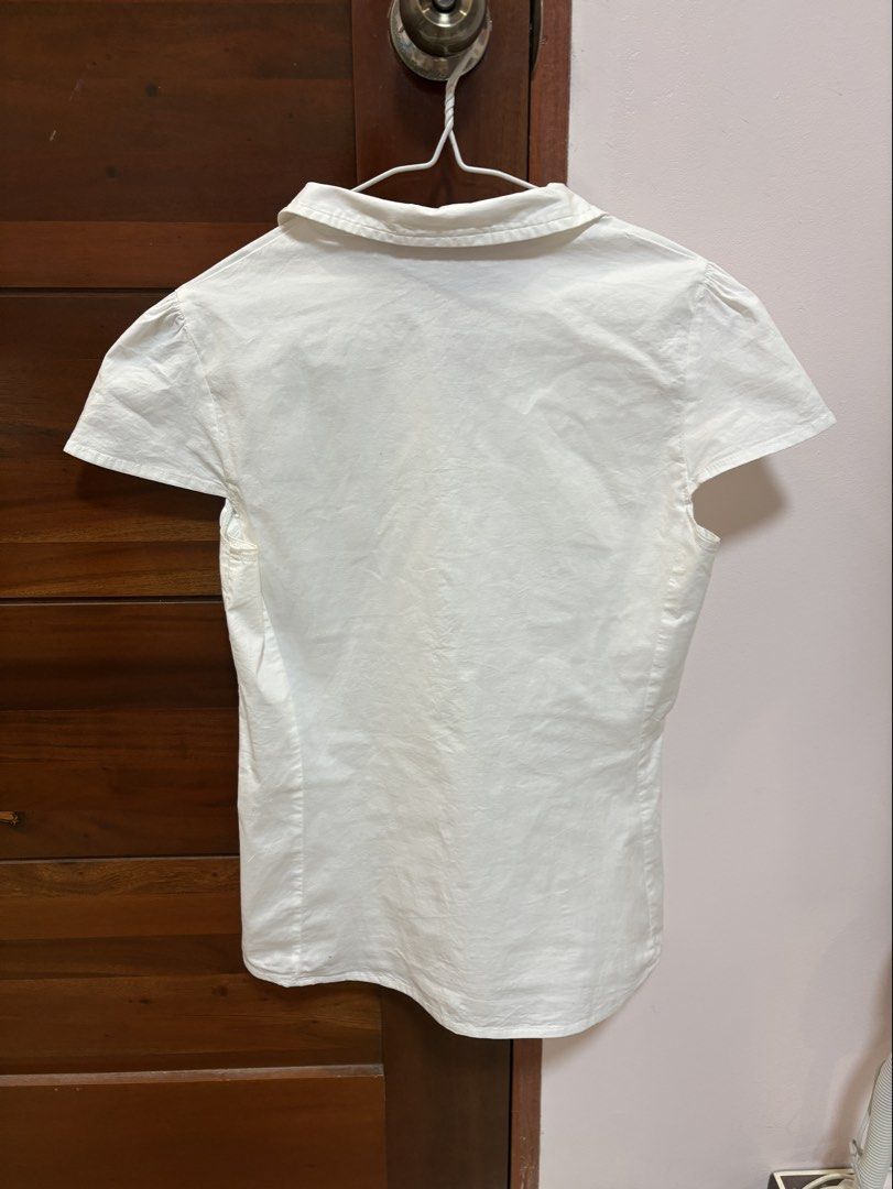 Brandy Melville Rue Top (in White) (Category: Others Tops) located in Quezon City. Submitted by jjccly (Listing ID 1456576714, Image 3). Description: pre-loved pls manage ur expectations has minimal discoloration on ua (barely visible -> see last pics) no other flaws/issues rfs: decluttering .